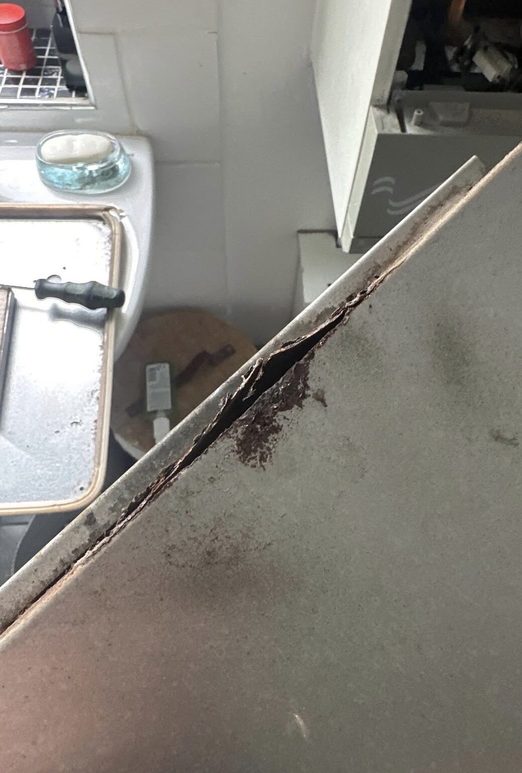 Severe corrosion and opening in the old boiler combustion chamber